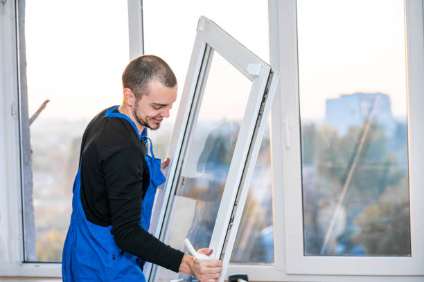Professional master at repair and installation of windows, at work.