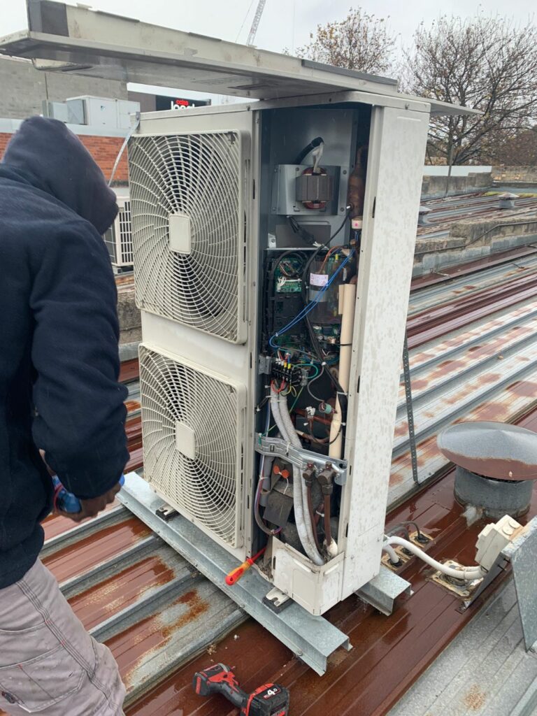 Surrey Air technician doing Air Conditioning repair in Melbourne
