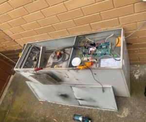 Surrey air technicians doing ducted heating repair in Melbourne