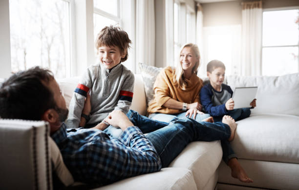 Shot of a happy family having fun together at home in good indoor air quality in winters