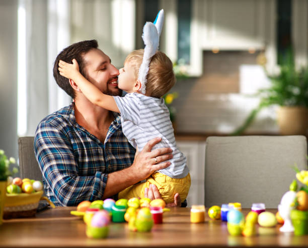 Father and son enjoying in home with serviced hvac system in spring season