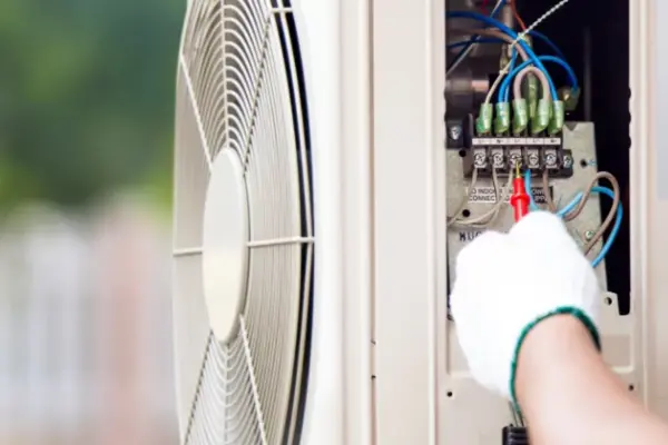 Surrey air technician doing air conditioning installation