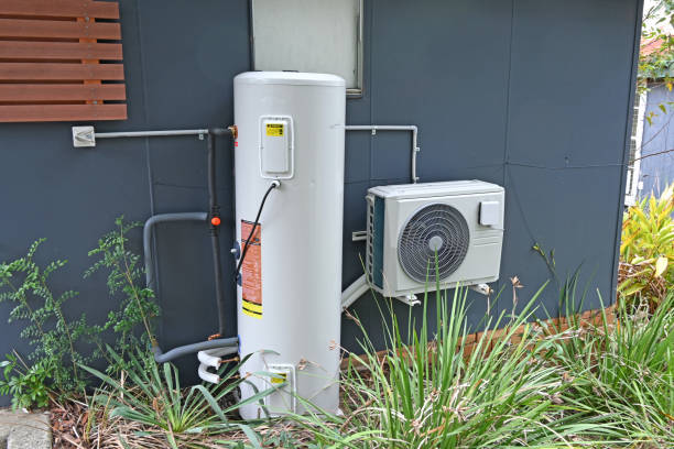 Heat pump hot water system with separate evaporator